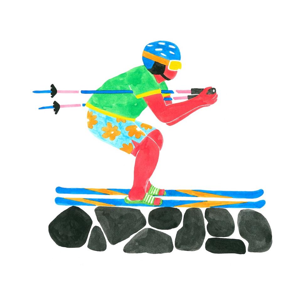 Un skieur sur des pierres